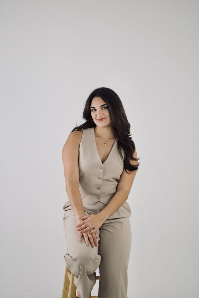 Leidy Melian, Southwest Florida Realtor, seated for a professional portrait
